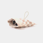 The tan checkered FattyPack, front view