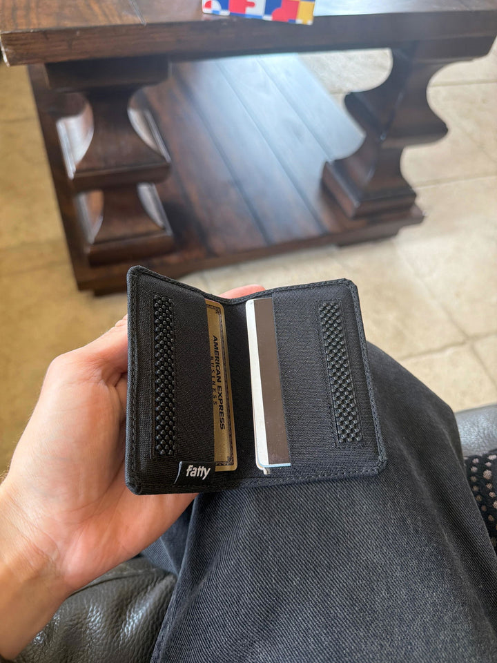 Customer holding an open Snap Wallet