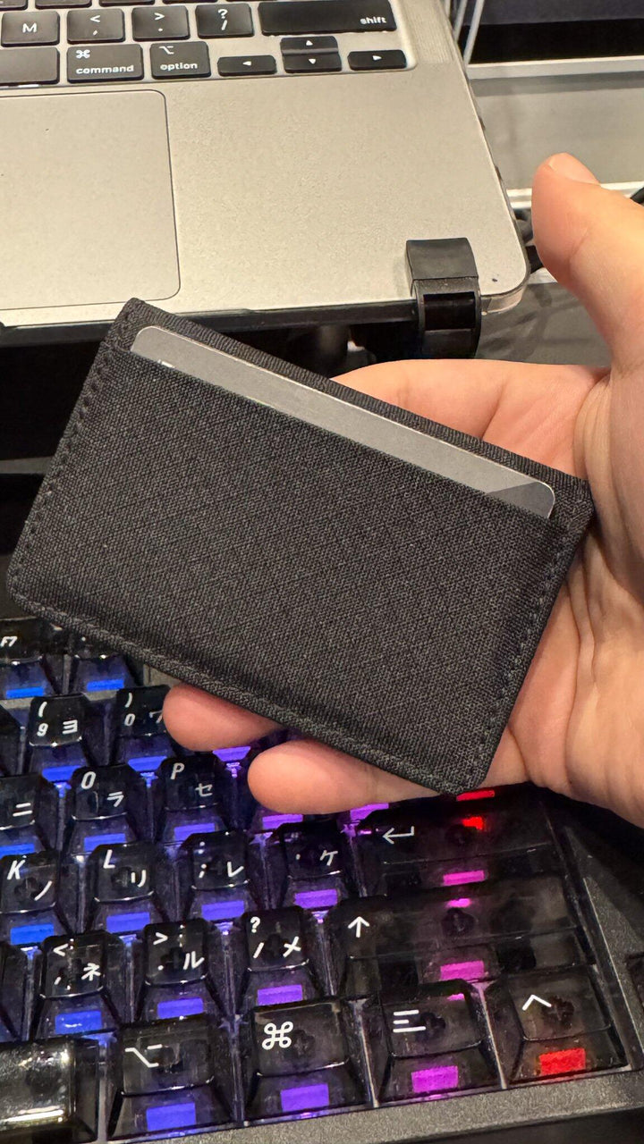 Snap Wallet held over a keyboard
